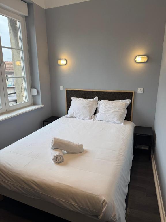 Postel nebo postele na pokoji v ubytování Abc Hotel