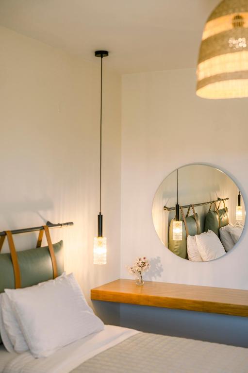 Postel nebo postele na pokoji v ubytování Legends Hotel Sidari Corfu