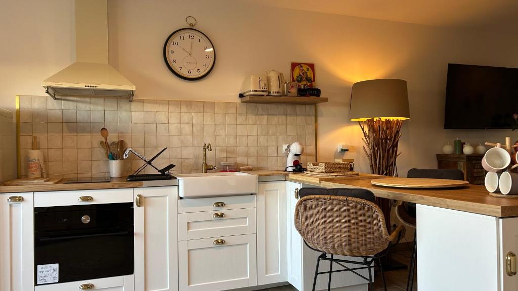 Kuchyň nebo kuchyňský kout v ubytování Loft sauna balnéothérapie