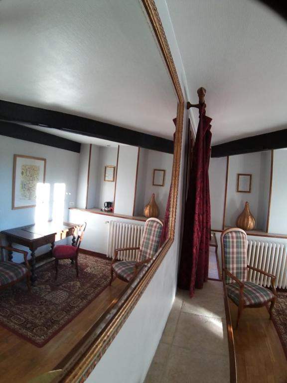 Posezení v ubytování Manoir XV Domaine de Peyrafort