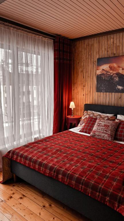 Postel nebo postele na pokoji v ubytování Chalet Blanc