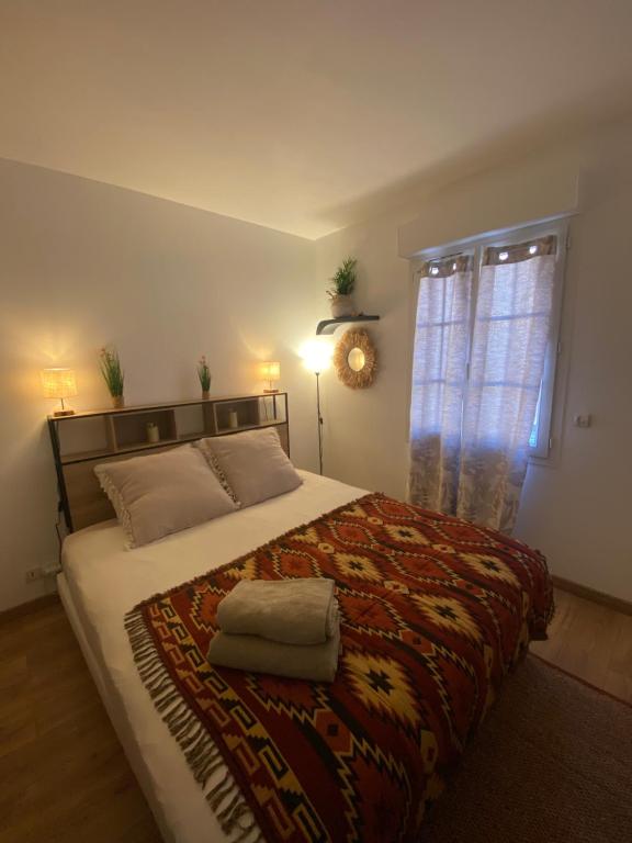 Postel nebo postele na pokoji v ubytování b&b du Clos Ménil