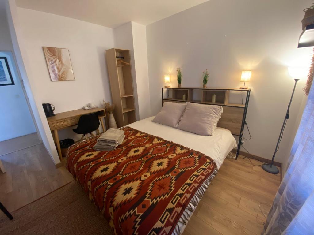 Postel nebo postele na pokoji v ubytování b&b du Clos Ménil