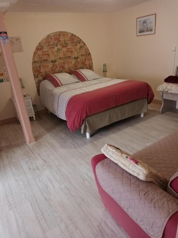 Postel nebo postele na pokoji v ubytování l'ancienne épicerie