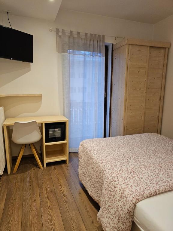 Postel nebo postele na pokoji v ubytování Garni San Lorenzo