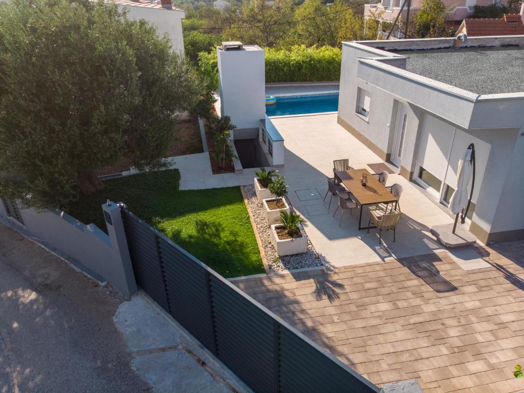 Bazén v ubytovaní d'House Vinišće alebo v jeho blízkosti