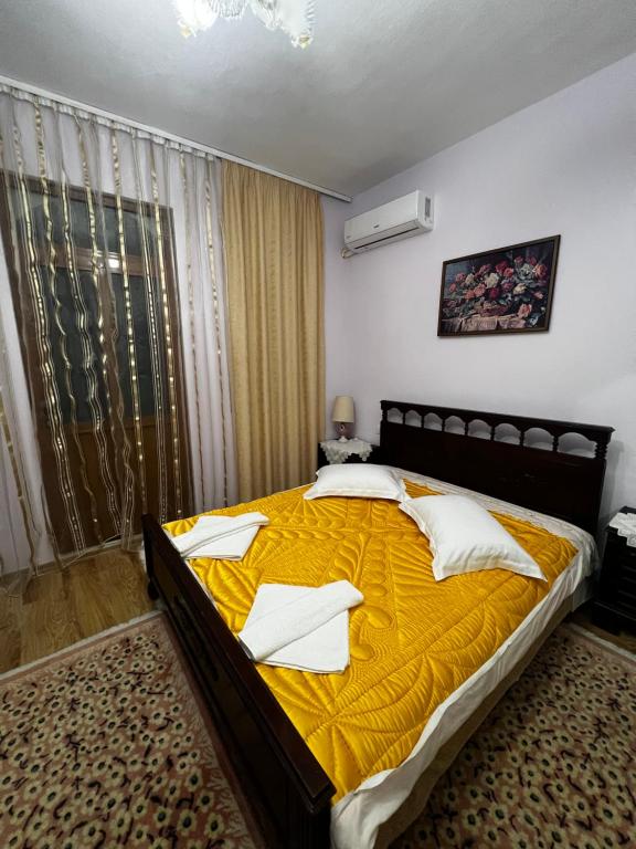 Postel nebo postele na pokoji v ubytování Luigi Guest House
