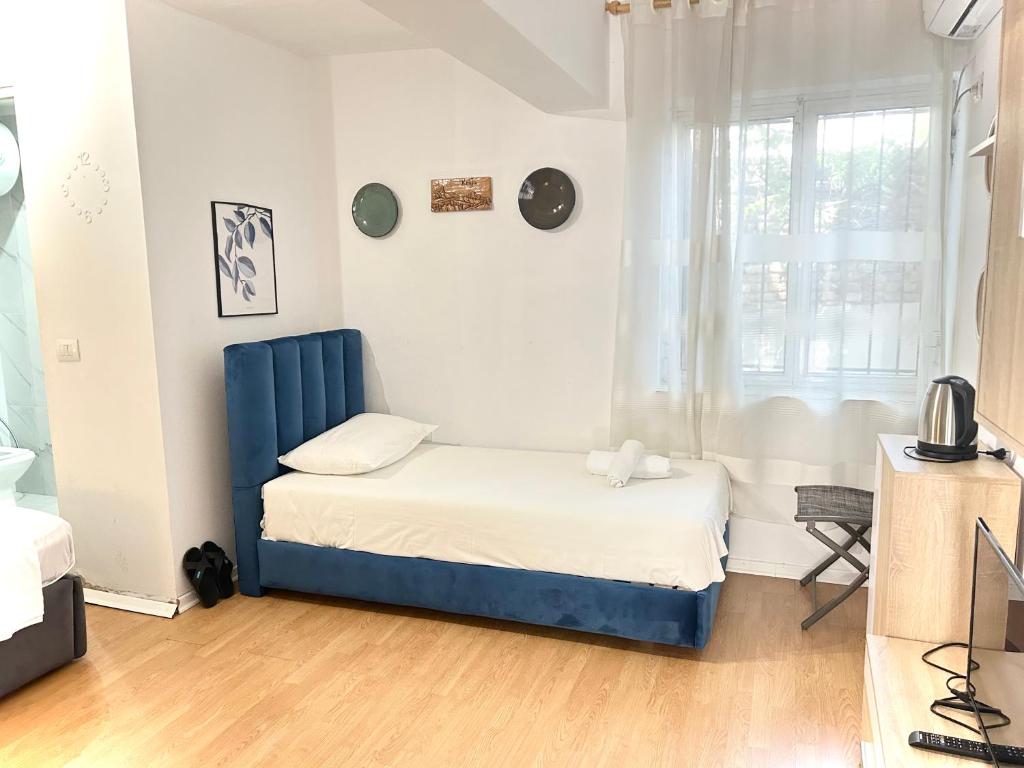 Postel nebo postele na pokoji v ubytování Budget Hotel