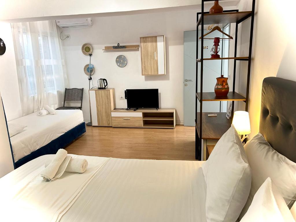 Postel nebo postele na pokoji v ubytování Budget Hotel