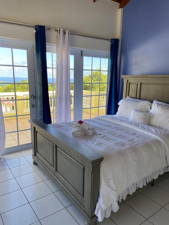 Letto o letti in una camera di Seabliss Villa