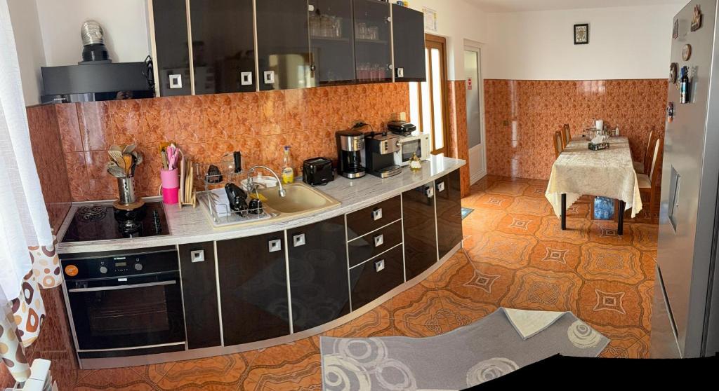 Kuchyň nebo kuchyňský kout v ubytování Casa Daria