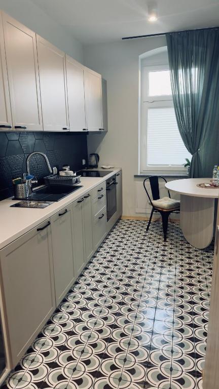 Kuchyň nebo kuchyňský kout v ubytování Apartament SUDETY