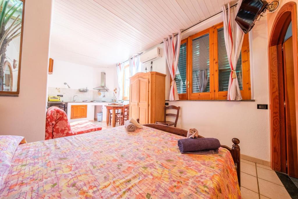 Postel nebo postele na pokoji v ubytování B&B Il Giardino Segreto