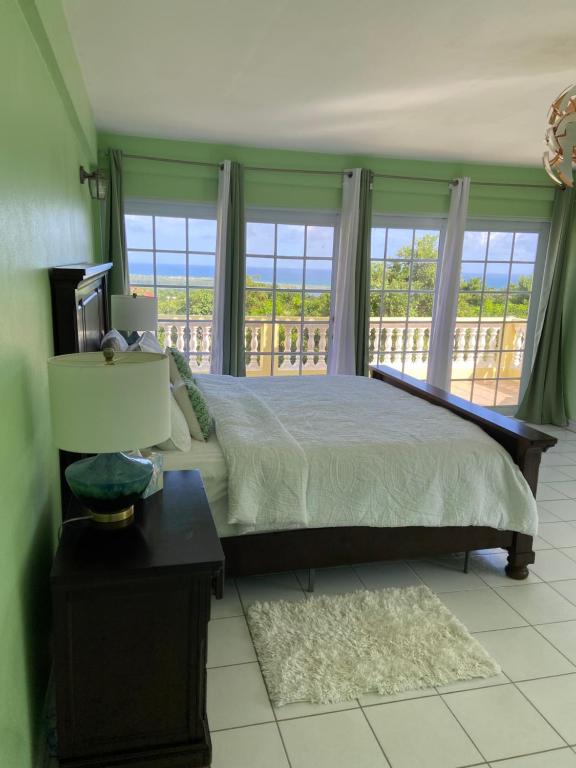 Letto o letti in una camera di Seabliss Villa