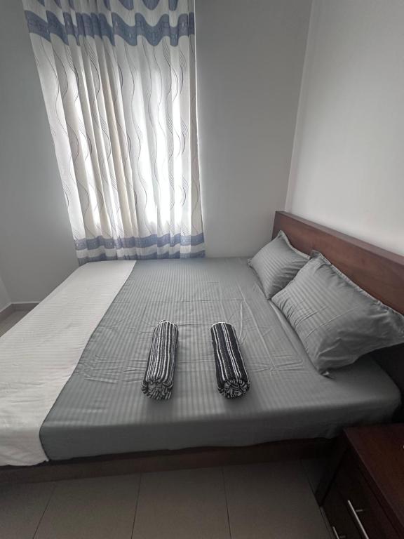Postel nebo postele na pokoji v ubytování Urban Nest Studio