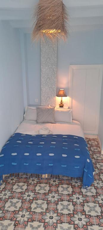 Postel nebo postele na pokoji v ubytování SUMMER HOUSE TANGER