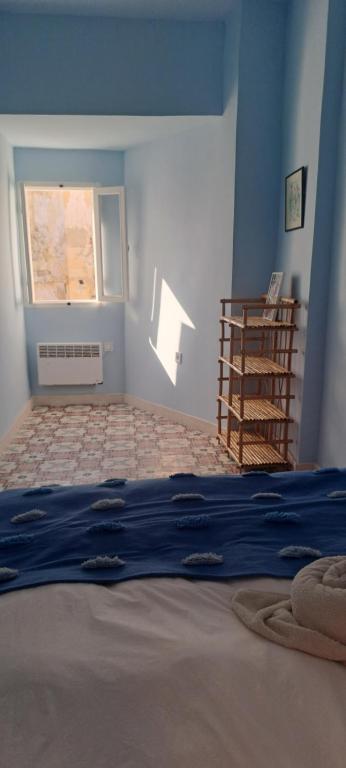 Postel nebo postele na pokoji v ubytování SUMMER HOUSE TANGER