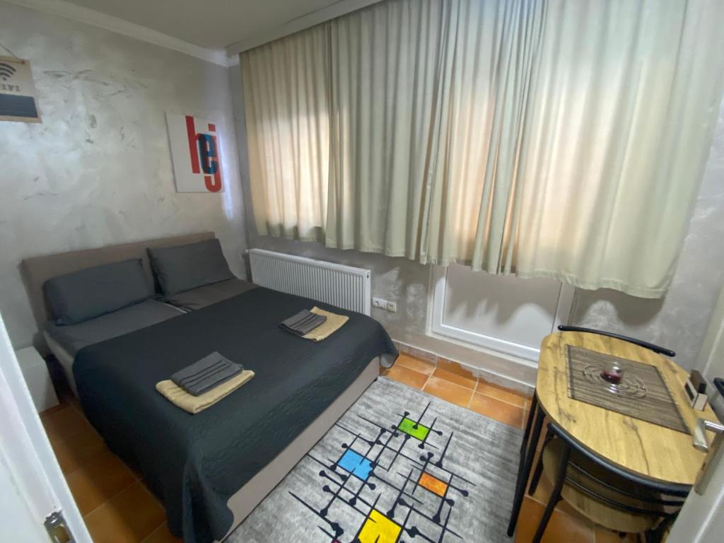 A seating area at Apartmani Vrabac 4