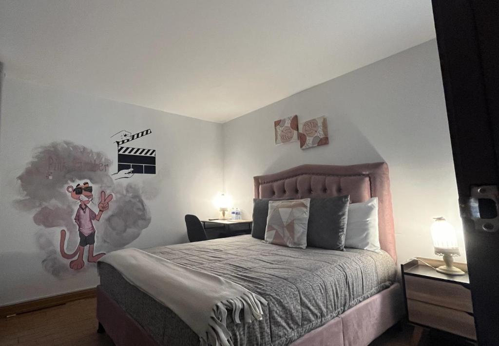 Postel nebo postele na pokoji v ubytování HOSTAL SEP7IMO ARTE