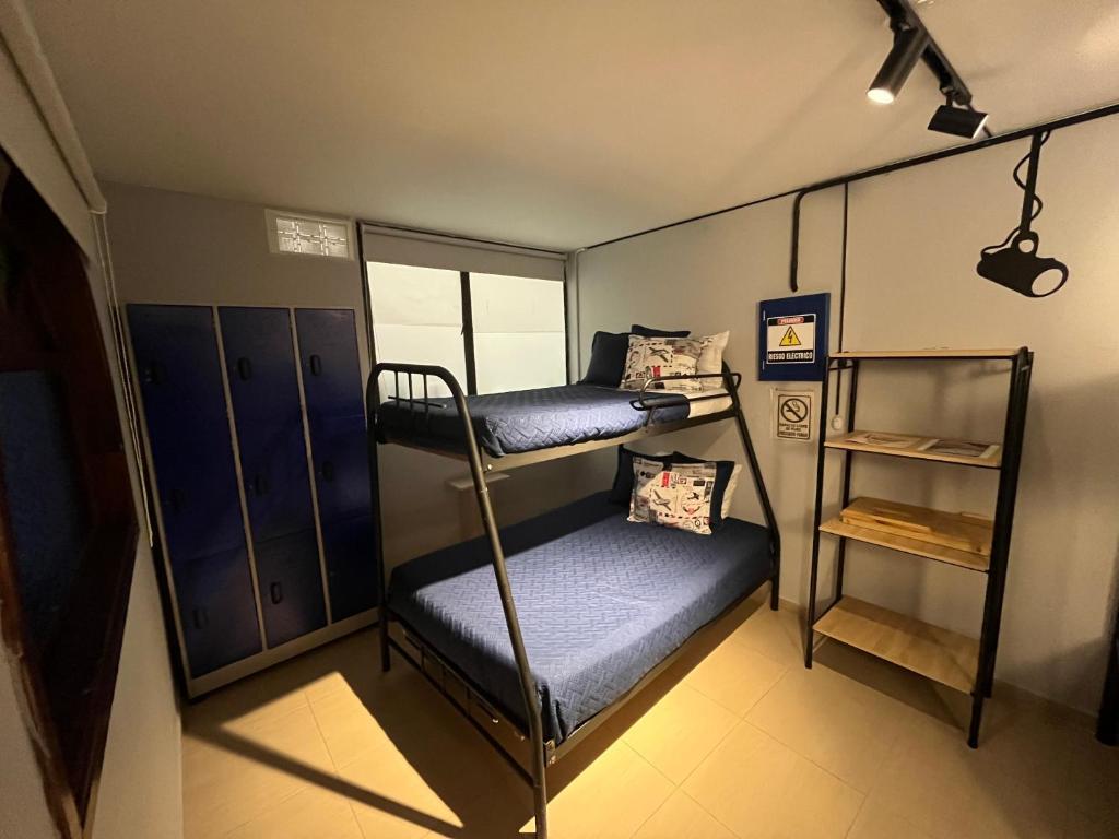 Postel nebo postele na pokoji v ubytování HOSTAL SEP7IMO ARTE
