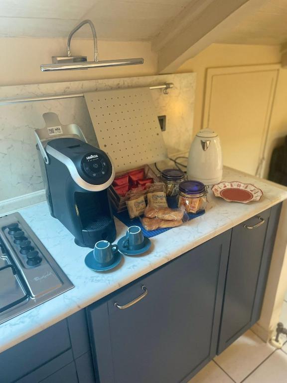 Kuchyň nebo kuchyňský kout v ubytování Lecasedialex it casa Kiwi
