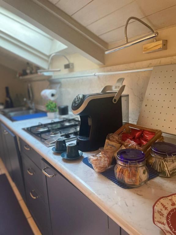 Kuchyň nebo kuchyňský kout v ubytování Lecasedialex it casa Kiwi
