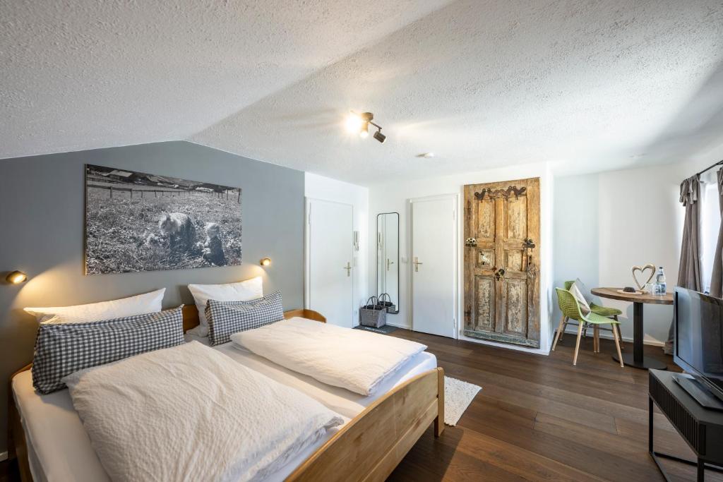 Postel nebo postele na pokoji v ubytování Gästehaus Dauser