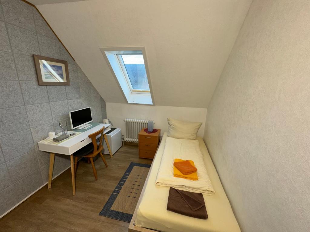 TV a/nebo společenská místnost v ubytování Haus Ostseestrand36
