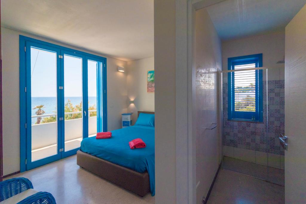 Postel nebo postele na pokoji v ubytování Solmaris Seaside - B&B sul mare