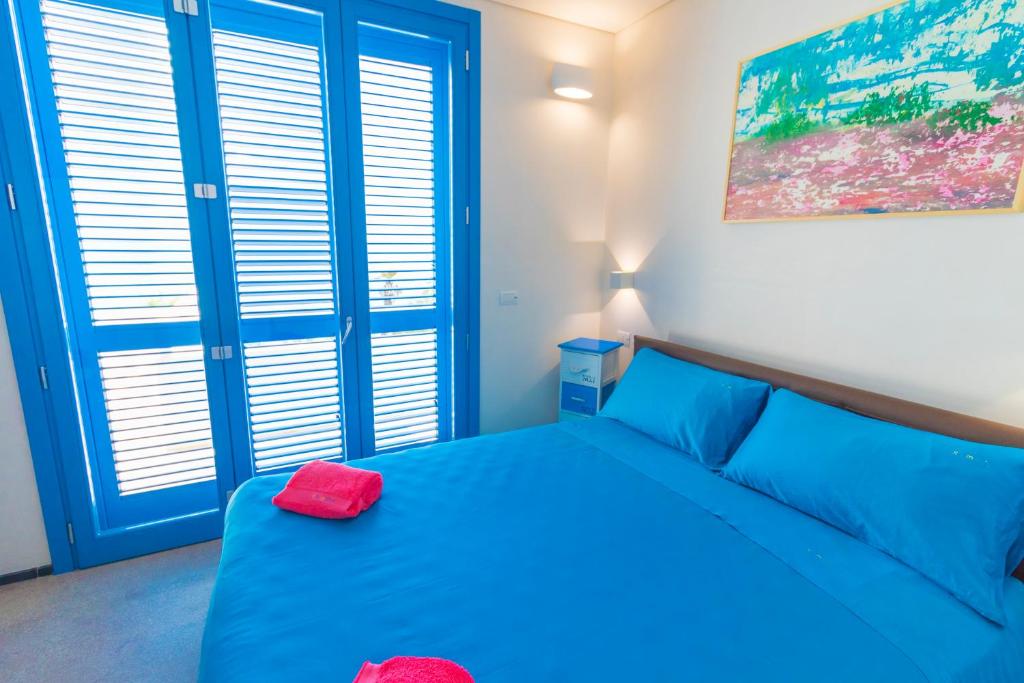 Postel nebo postele na pokoji v ubytování Solmaris Seaside - B&B sul mare