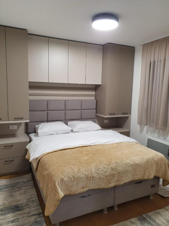 Postel nebo postele na pokoji v ubytování Villa Jezero 4