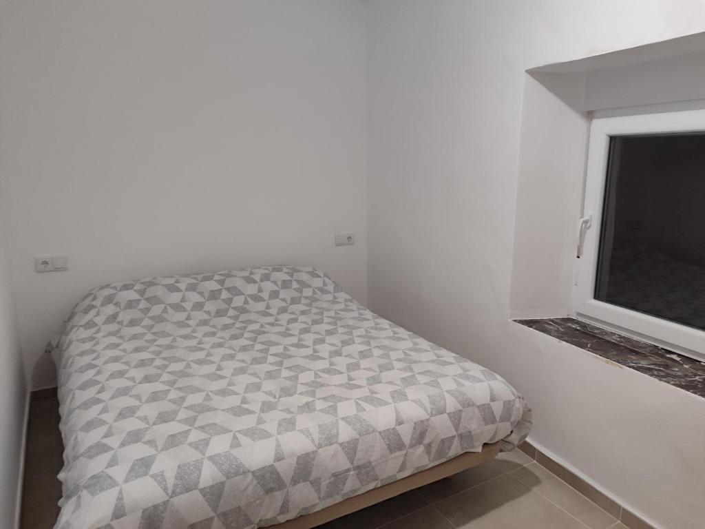 Postel nebo postele na pokoji v ubytování casa del cura