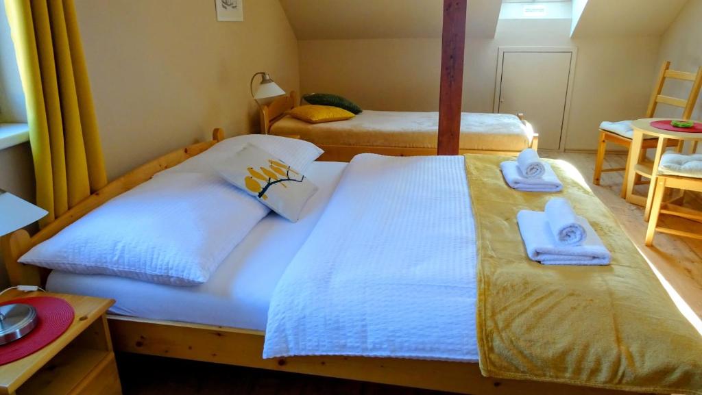 Postel nebo postele na pokoji v ubytování Apartmán Nesyt