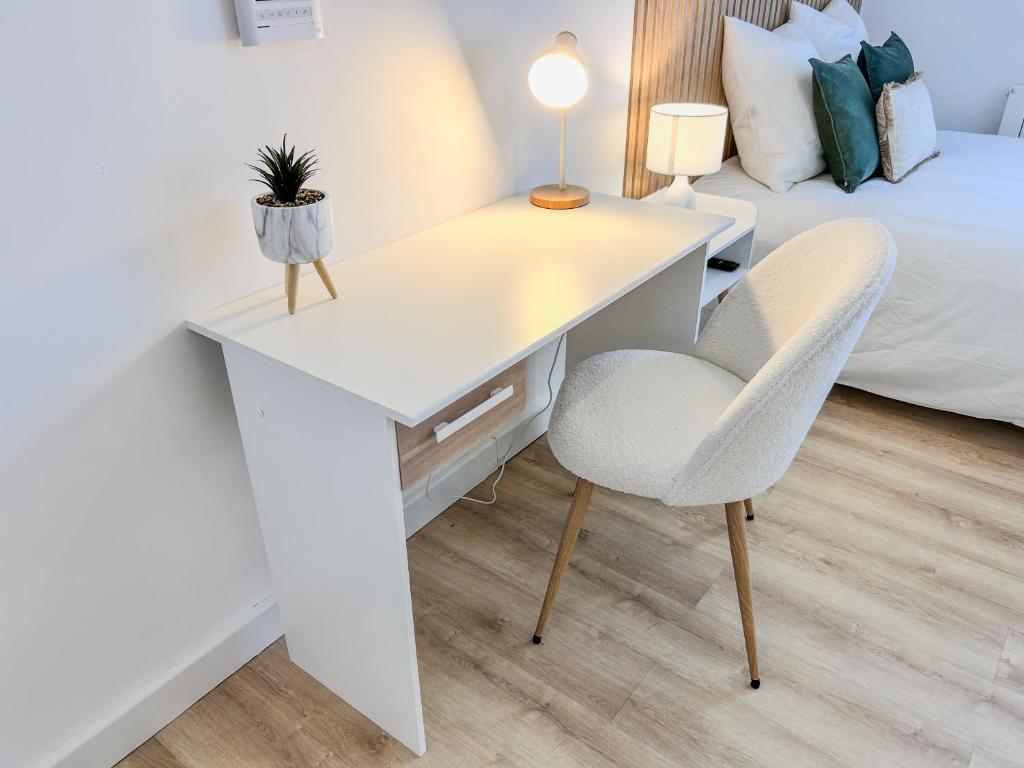 Postel nebo postele na pokoji v ubytování Studio Cosy idéalement situé