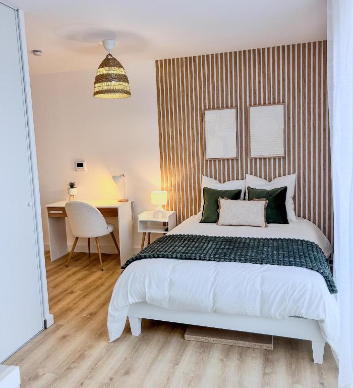 Postel nebo postele na pokoji v ubytování Studio Cosy idéalement situé