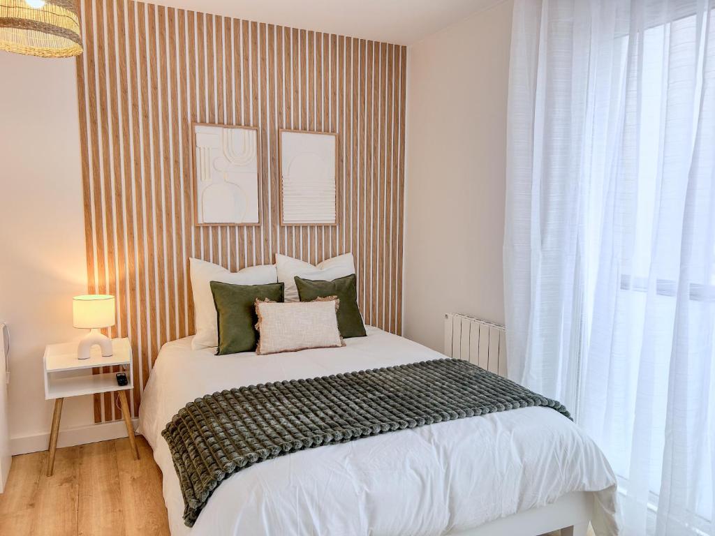 Postel nebo postele na pokoji v ubytování Studio Cosy idéalement situé
