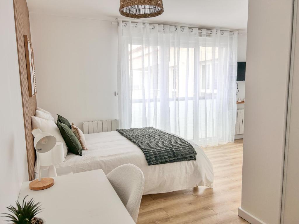 Postel nebo postele na pokoji v ubytování Studio Cosy idéalement situé