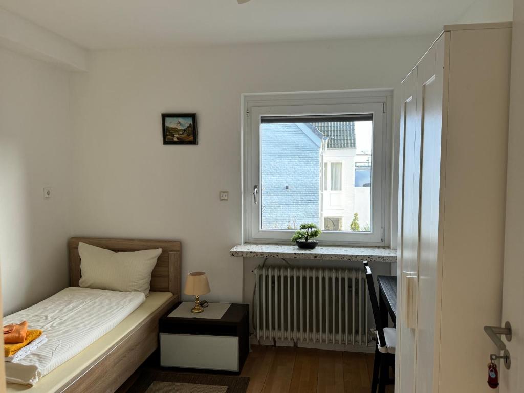 Postel nebo postele na pokoji v ubytování Haus Ostseestrand36