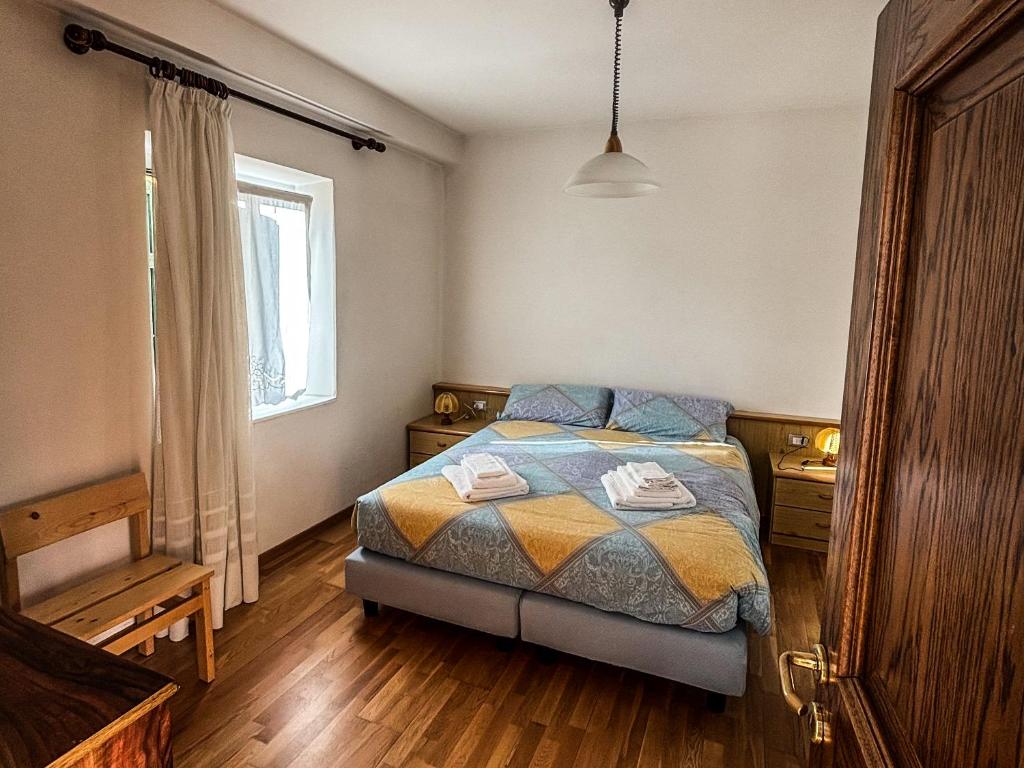 Postel nebo postele na pokoji v ubytování Casa Tone