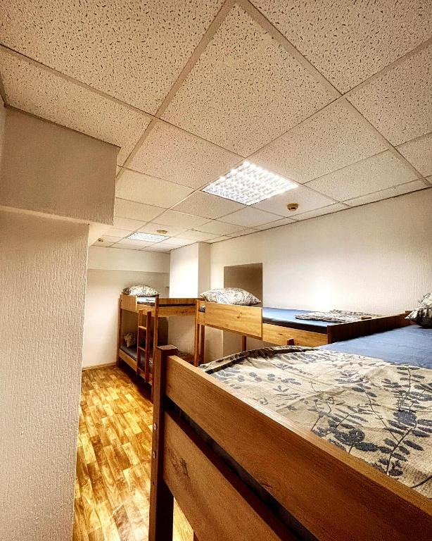Postel nebo postele na pokoji v ubytování Hostel Cozzydine