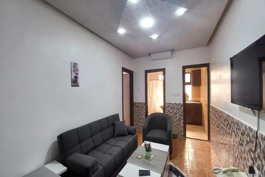 Posezení v ubytování Al-Nujoom Hotel Suites