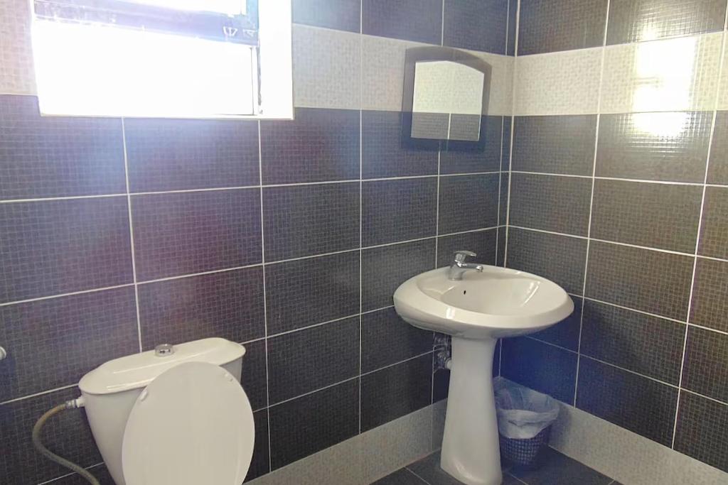 Koupelna v ubytování Al-Nujoom Hotel Suites