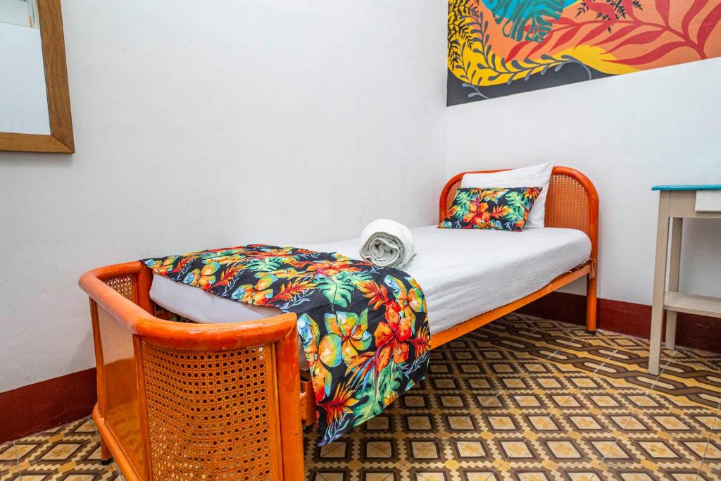 Postel nebo postele na pokoji v ubytování Hotel Kasa Dokari