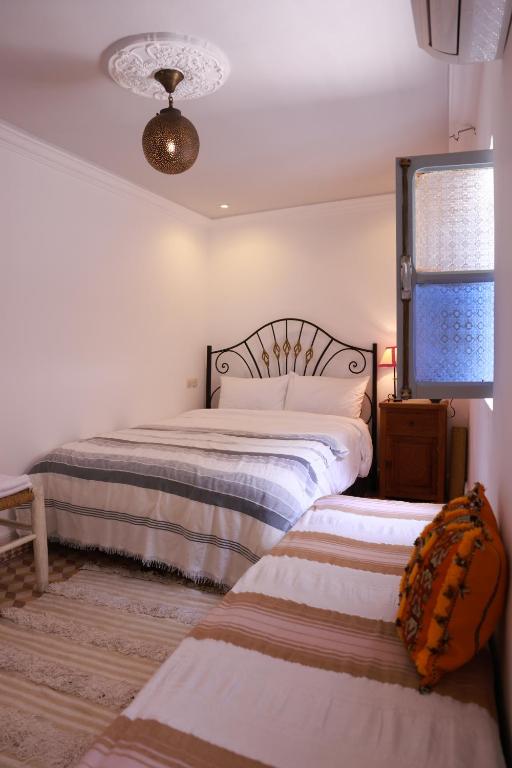 Postel nebo postele na pokoji v ubytování Maison Imane Marrakech