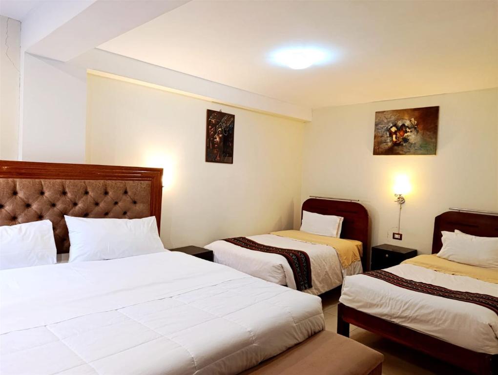 Postel nebo postele na pokoji v ubytování Hotel Humantay lodge Ollantaytambo