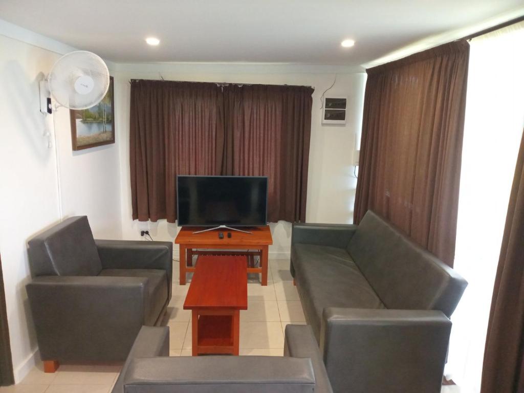 TV a/nebo společenská místnost v ubytování Dreamview Villas