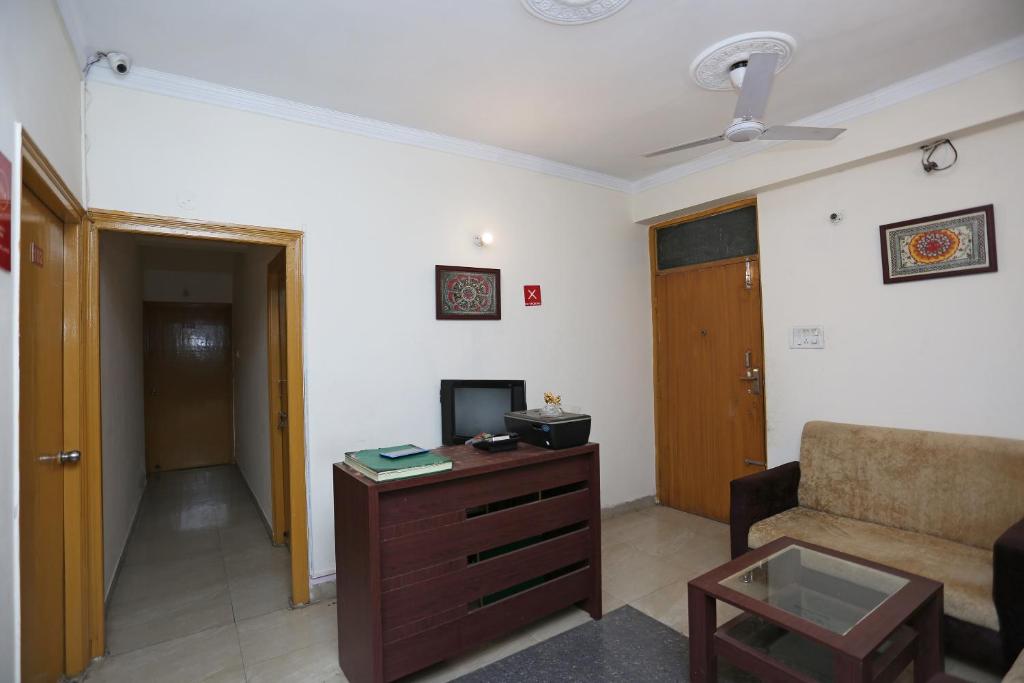 TV a/nebo společenská místnost v ubytování Vibrant Guest House
