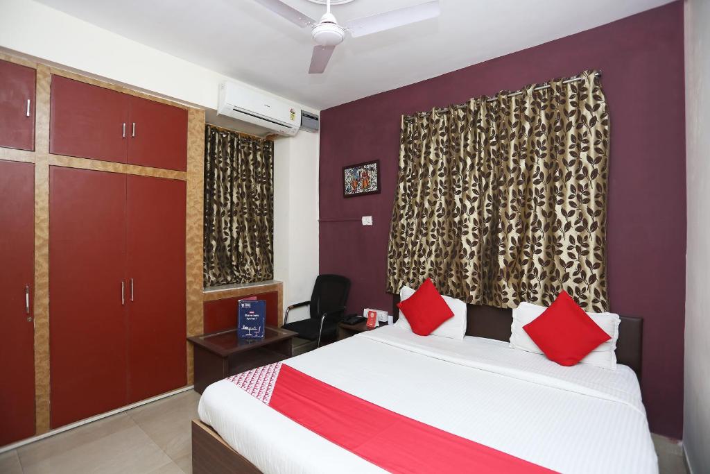 Postel nebo postele na pokoji v ubytování Vibrant Guest House