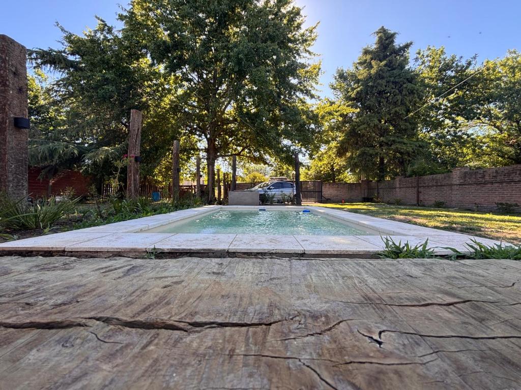 a swimming pool in the middle of a driveway at La Estancia in Ybarlucea