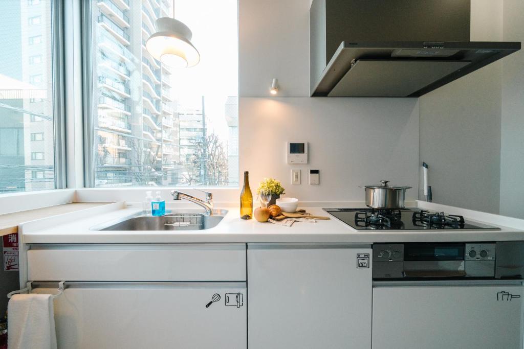Kuchyň nebo kuchyňský kout v ubytování Tokyo Cabin